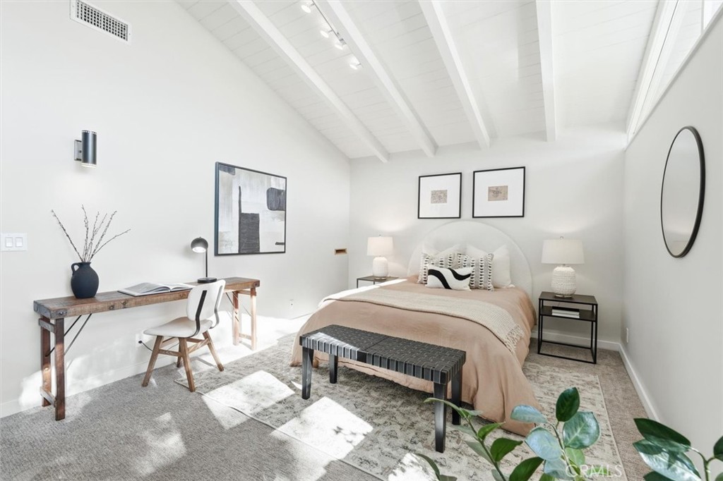 1205 Bryant Road Long Beach, CA 90815 - Photo 26 of 69 a bedroom with a bed a table and chair