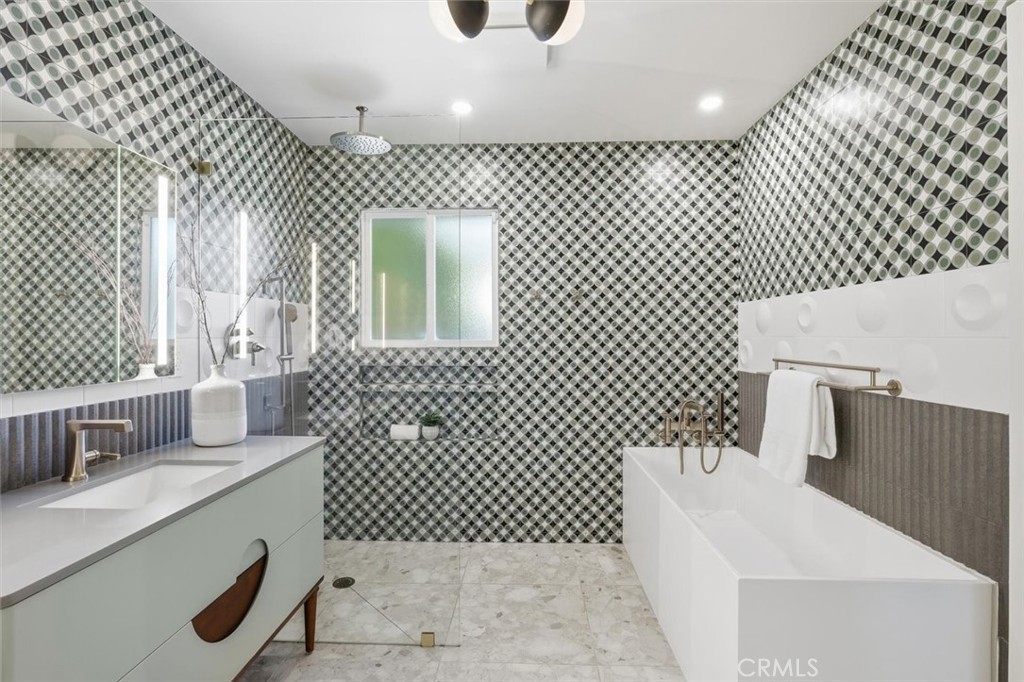 1205 Bryant Road Long Beach, CA 90815 - Photo 31 of 69 a bathroom with a sink and a mirror