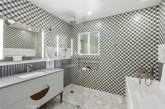 a view of a livingroom with furniture and a fireplace