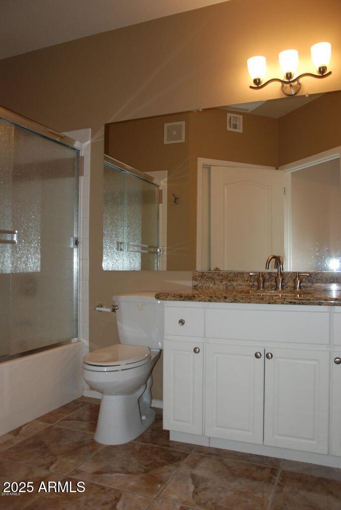 1701 East Colter Street, Unit 378 Phoenix, AZ 85016 - Photo 11 of 41 a bathroom with a sink and a toilet