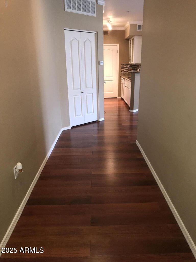 1701 East Colter Street, Unit 378 Phoenix, AZ 85016 - Photo 4 of 41 a view of entryway with wooden floor