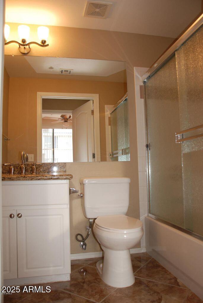 1701 East Colter Street, Unit 378 Phoenix, AZ 85016 - Photo 8 of 41 a bathroom with a toilet a sink and shower
