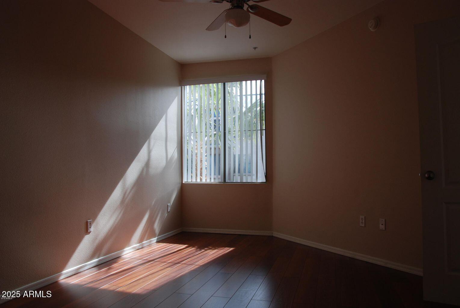 1701 East Colter Street, Unit 378 Phoenix, AZ 85016 - Photo 9 of 41 a view of an empty room with a window