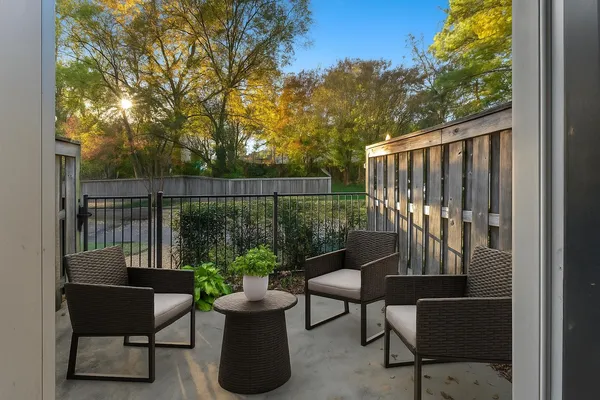 an aerial view of a house with a yard and garden