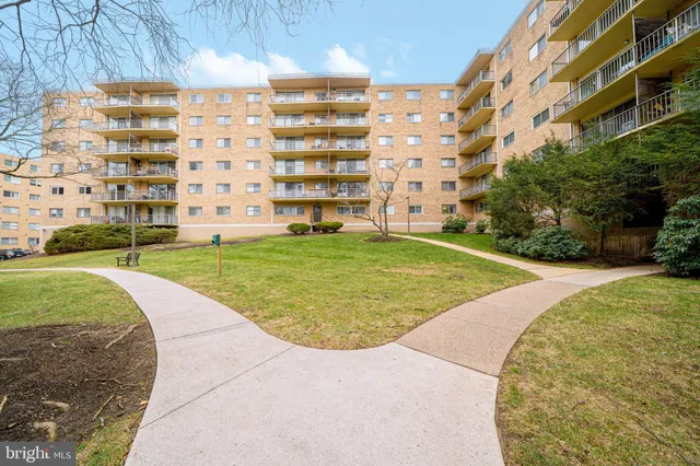 a view of parking with cars parked