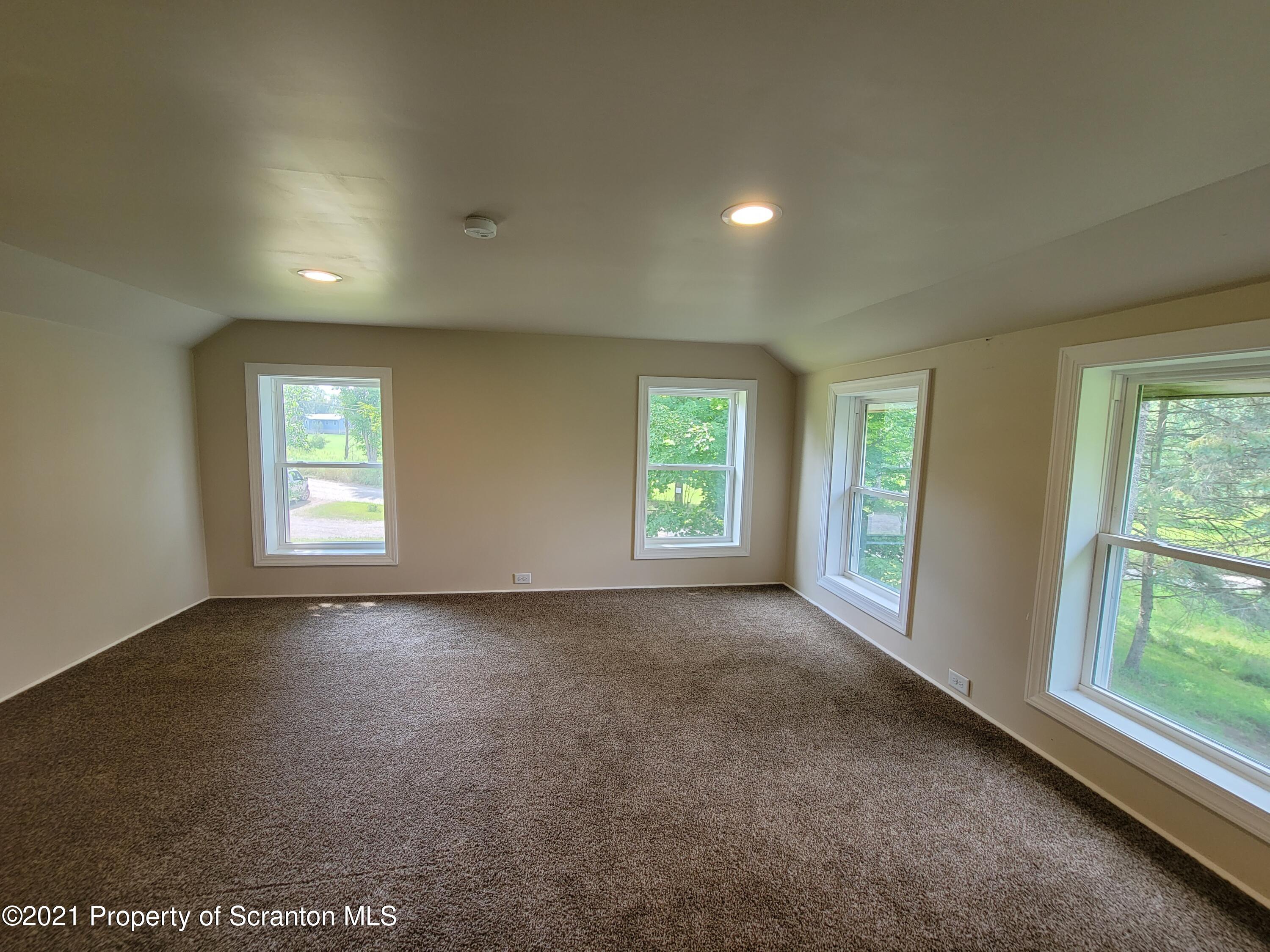 686 Wilcox Road Meshoppen, PA 18630 - Photo 16 of 30 a view of a livingroom with a window