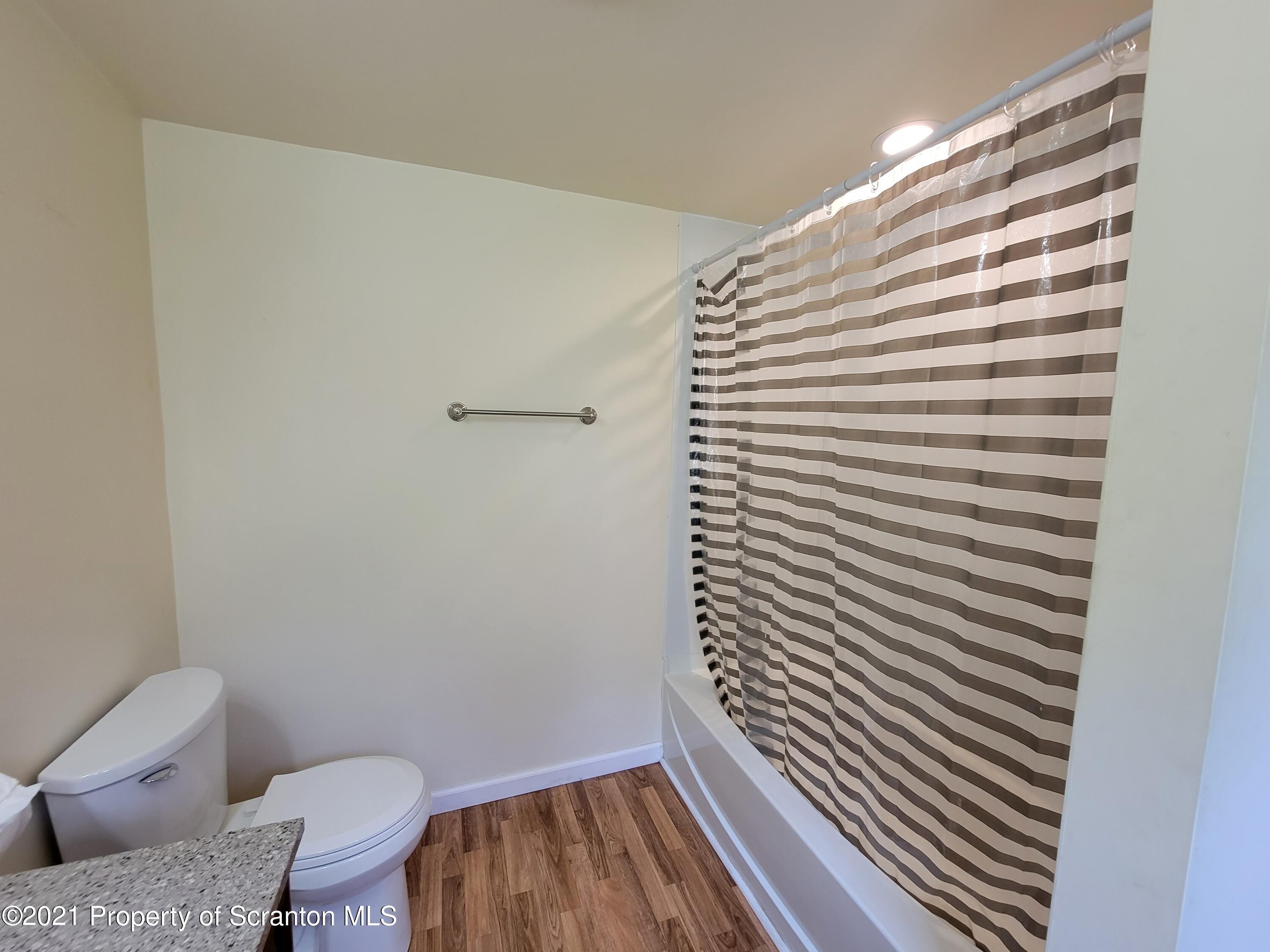 686 Wilcox Road Meshoppen, PA 18630 - Photo 24 of 30 a bathroom with a sink and a toilet