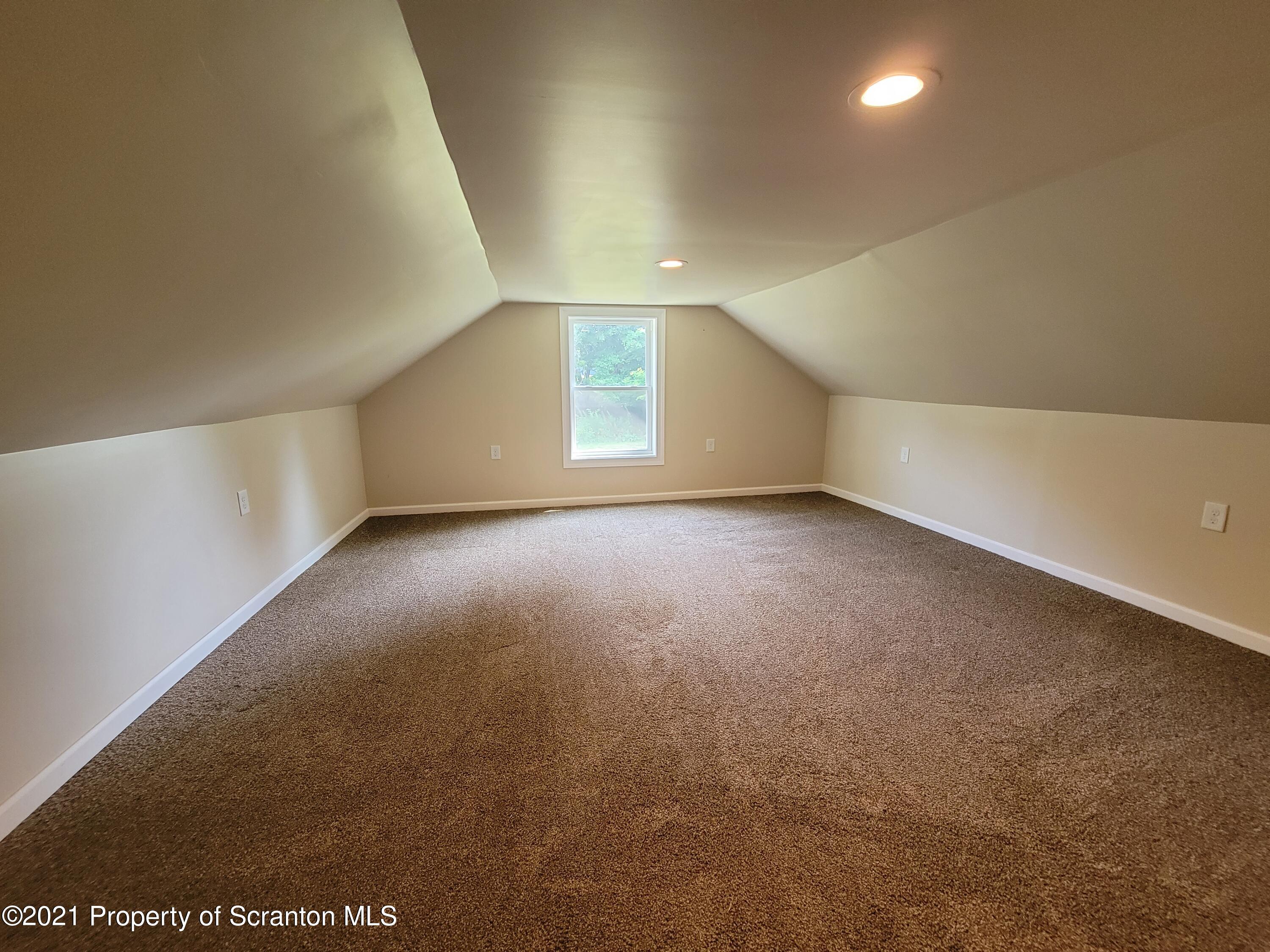 686 Wilcox Road Meshoppen, PA 18630 - Photo 28 of 30 an empty room with windows