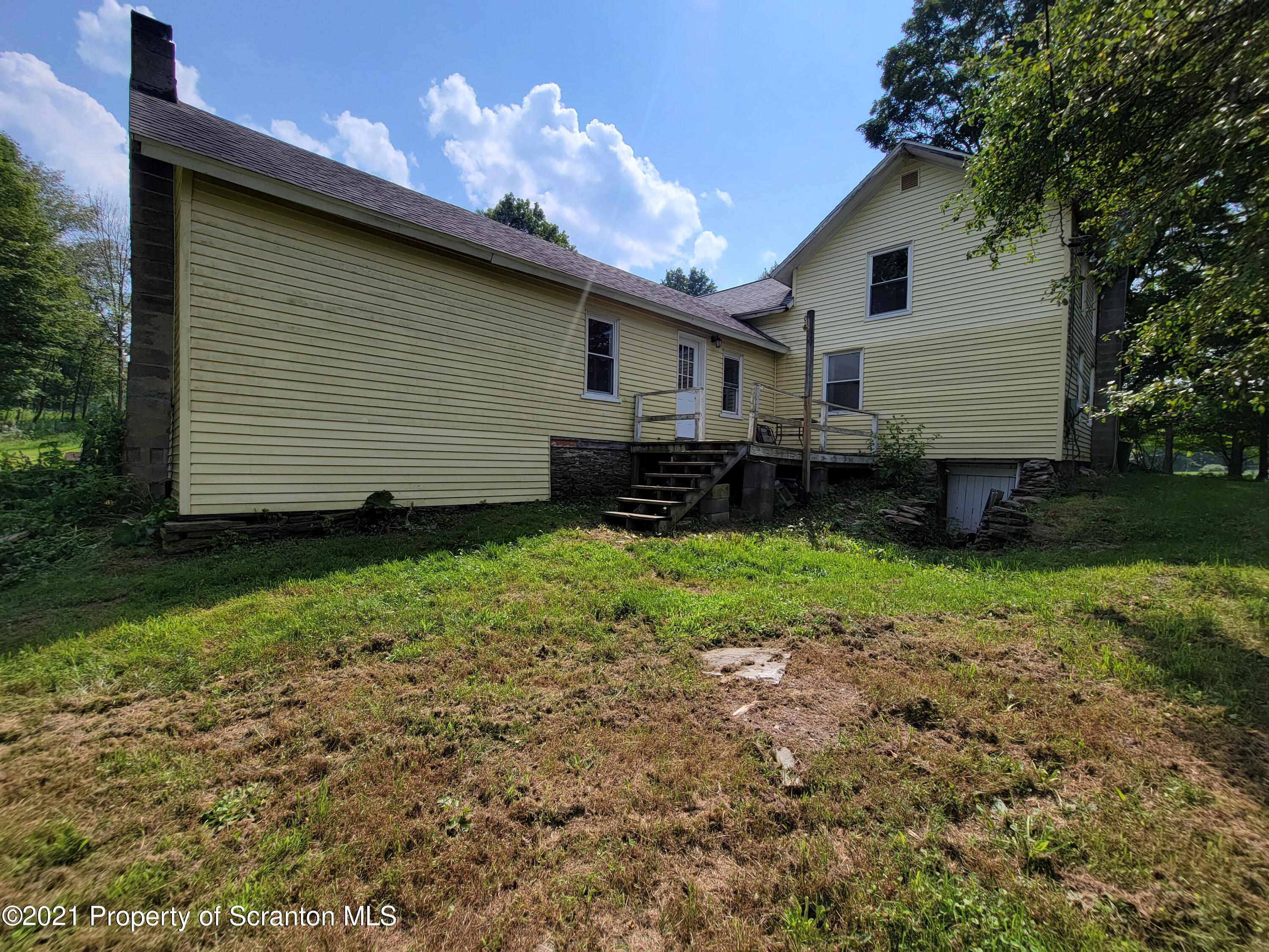 686 Wilcox Road Meshoppen, PA 18630 - Photo 8 of 30 a house view with a backyard space