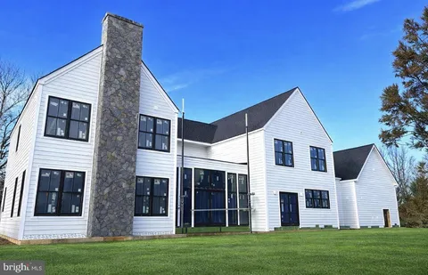 a view of a back yard of the house