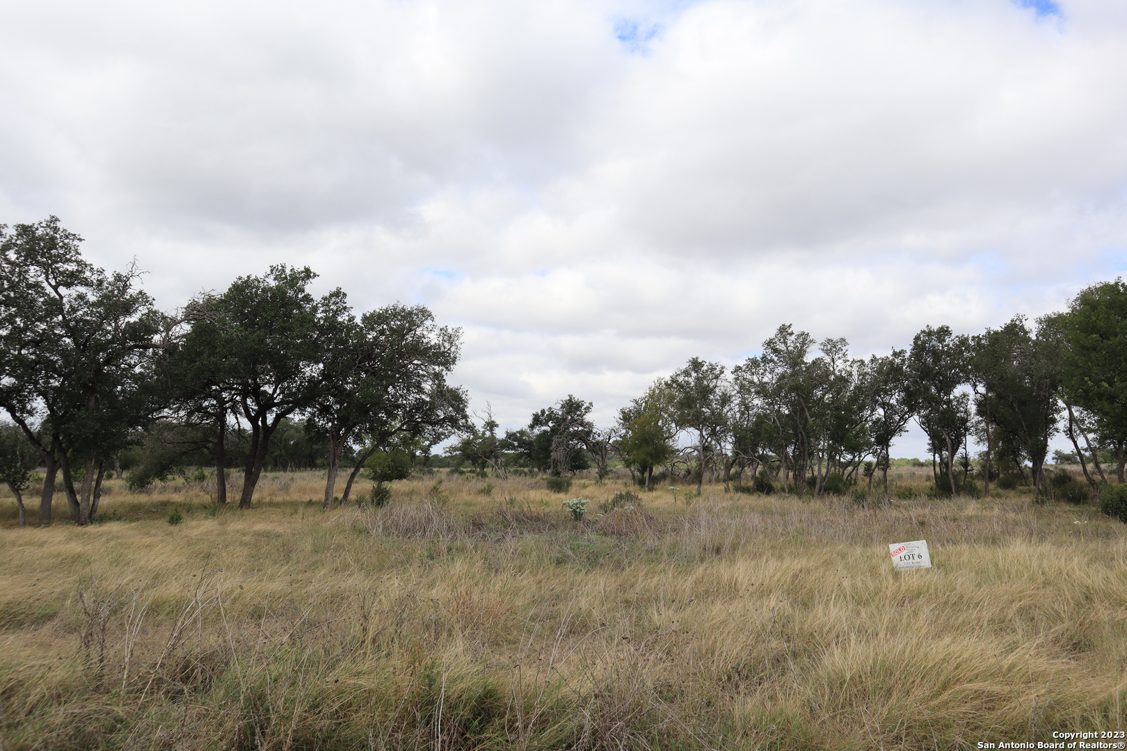 0 Clearwater Canyon Road Bandera, TX 78003 - Photo 1 of 9 a view of outdoor space with green field and trees