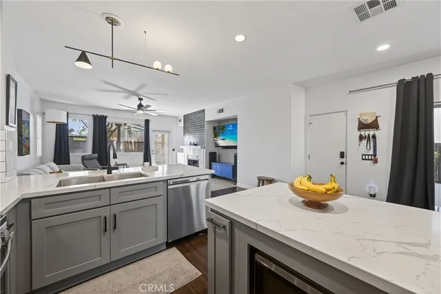 a kitchen with a sink and cabinets