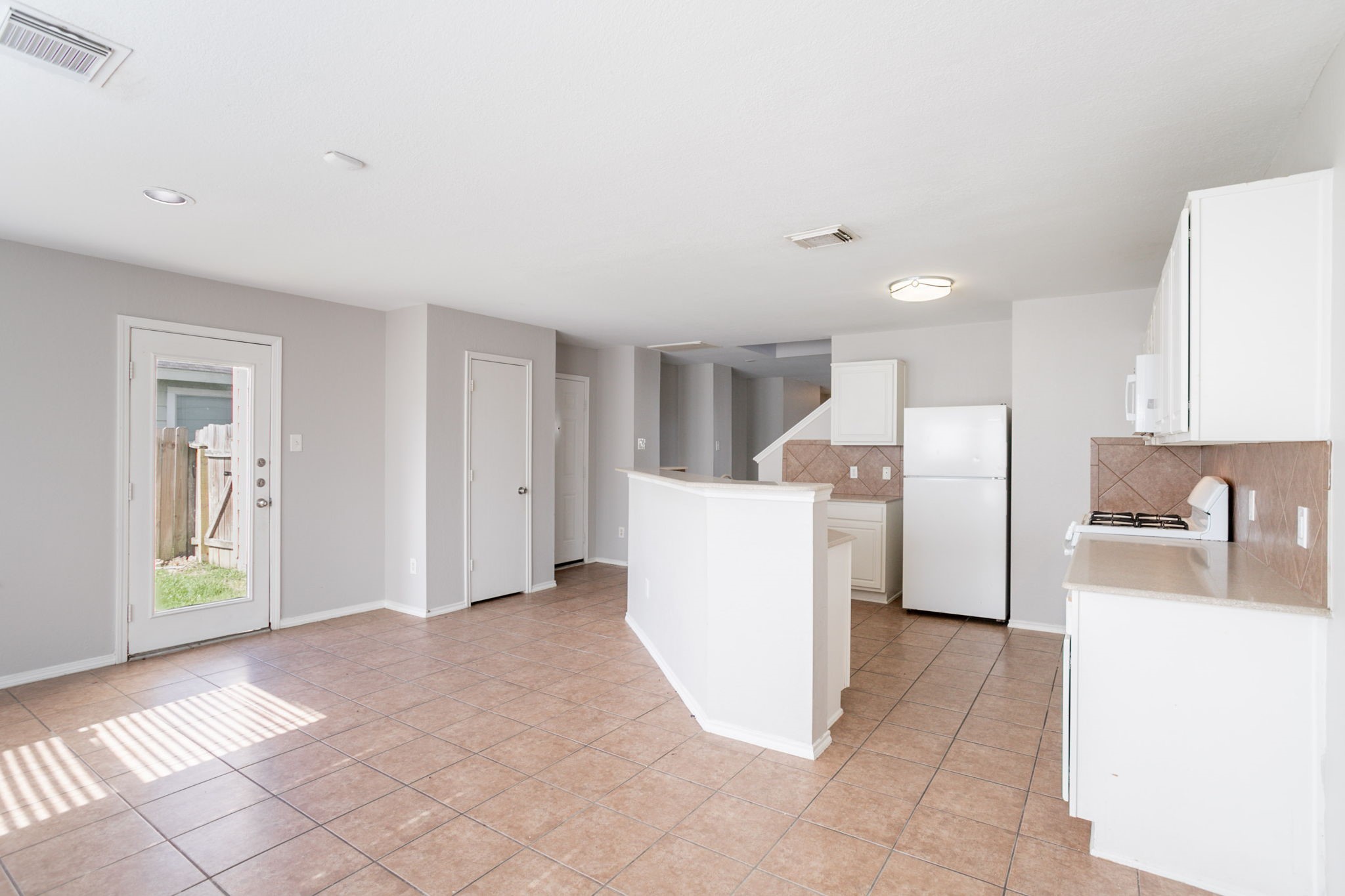 12026 Madison Oak Street Houston, TX 77038 - Photo 20 of 39 a view of a kitchen with a sink