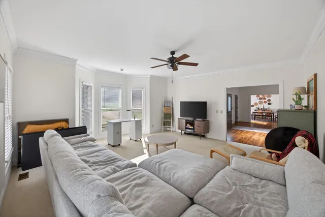 a living room with furniture and a couch