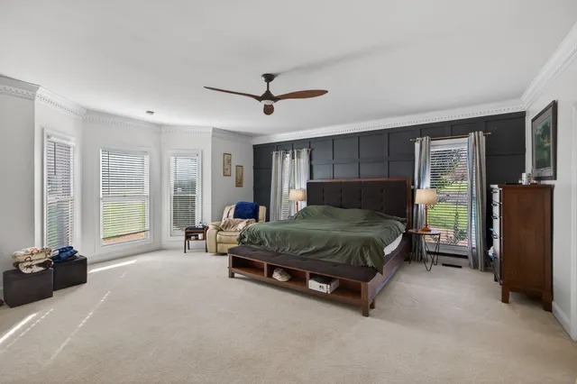 a bathroom with a sink double vanity and a mirror