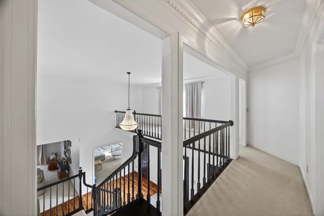 a bedroom with a bed and flat screen tv