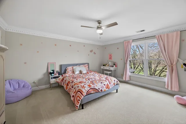 a bathroom with a granite countertop sink vanity and a mirror