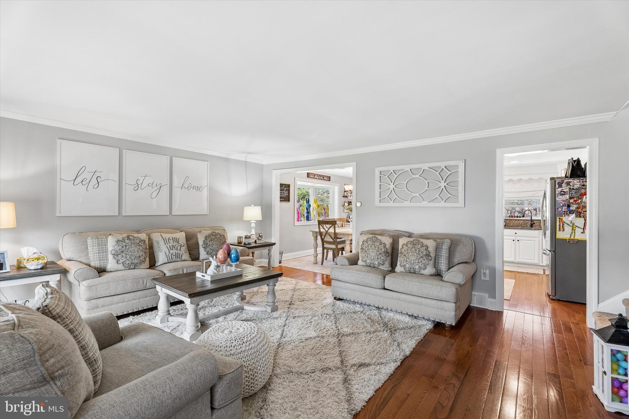 249 Gleaves Road Springfield, PA 19064 - Photo 3 of 34 a living room with furniture and wooden floor