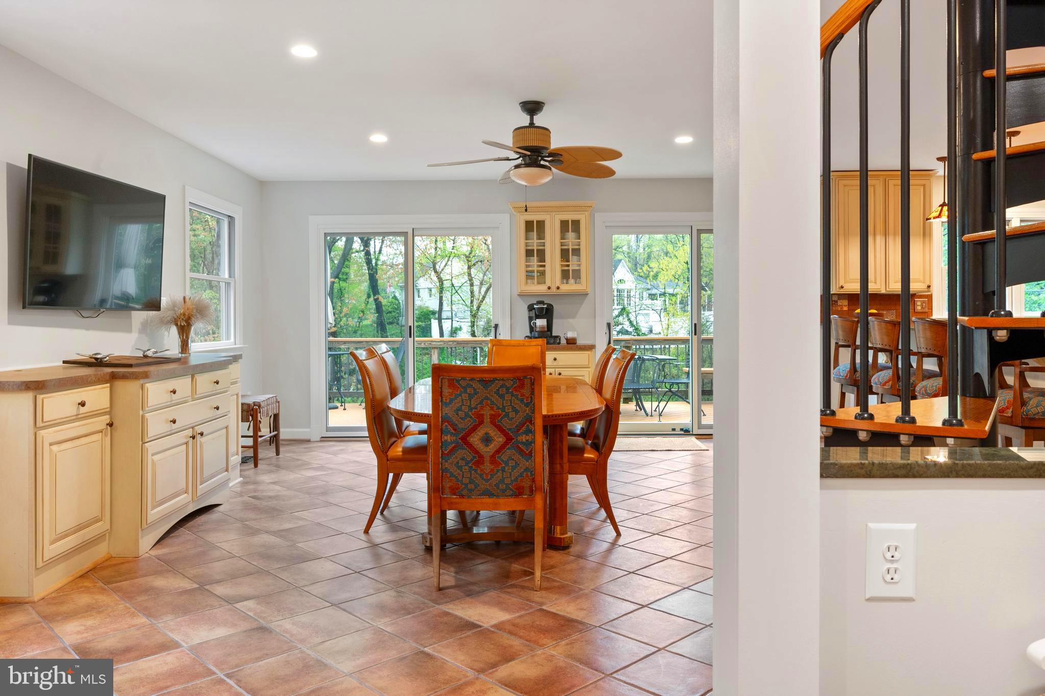 902 Emerald Drive Alexandria, VA 22308 - Photo 20 of 97 a view of a dining room with furniture window and outside view