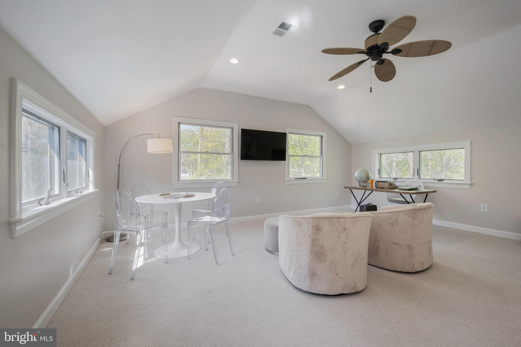902 Emerald Drive Alexandria, VA 22308 - Photo 48 of 97 a living room with furniture and a flat screen tv