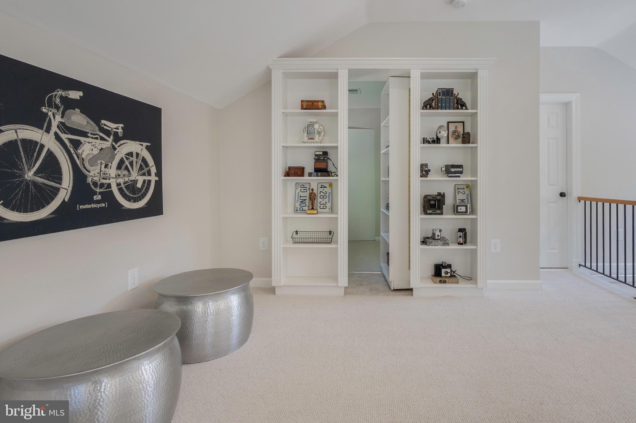 902 Emerald Drive Alexandria, VA 22308 - Photo 49 of 97 Hidden door in the bookcase!