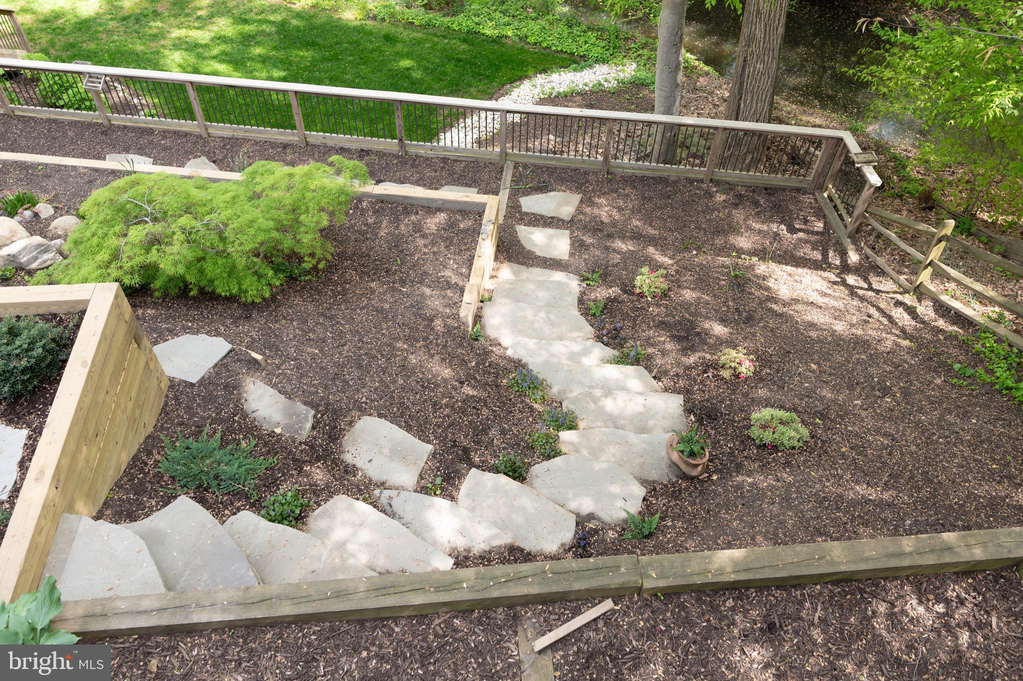 902 Emerald Drive Alexandria, VA 22308 - Photo 85 of 97 a view of a yard with a fountain