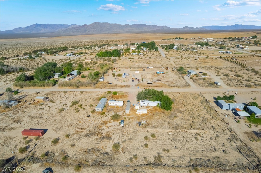 2350 Shawnee Street Sandy Valley, NV 89019 - Photo 11 of 38 Aerial overview of property's location with a desert landscape, rural landscape, and mountains