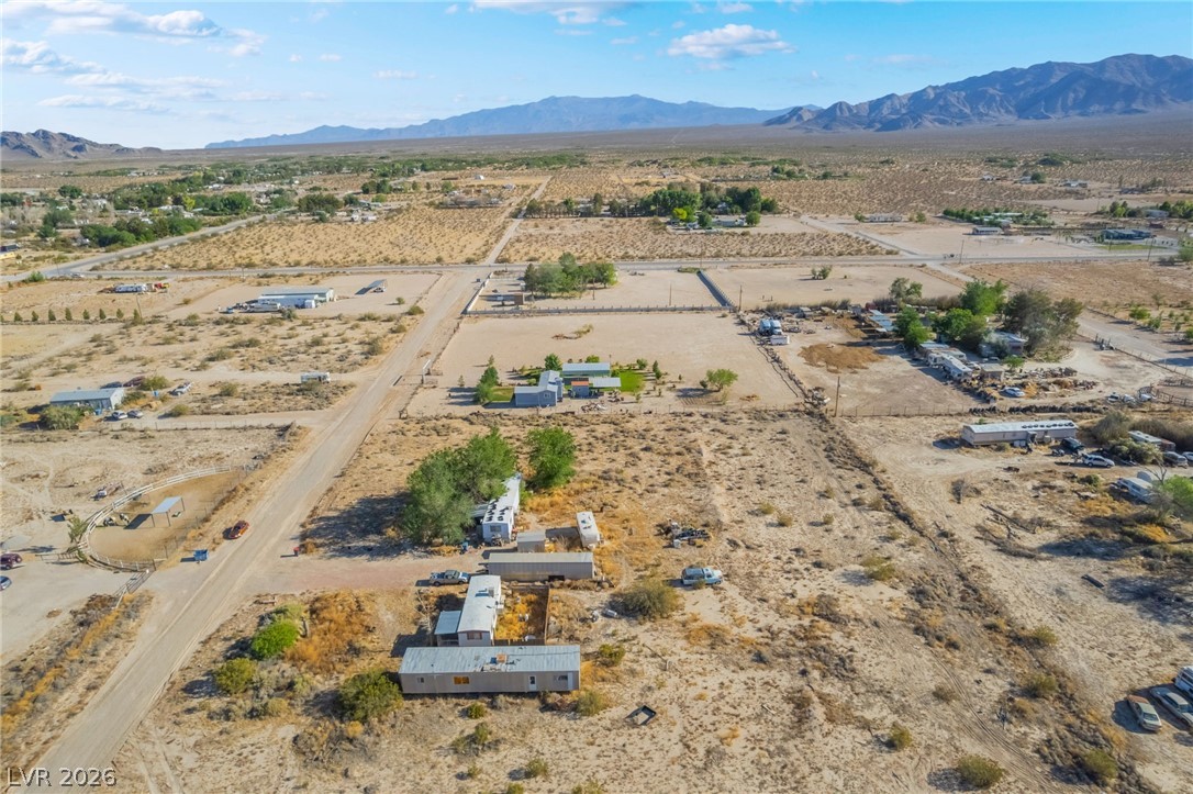 2350 Shawnee Street Sandy Valley, NV 89019 - Photo 12 of 38 View of rural area featuring a desert landscape and a mountain backdrop