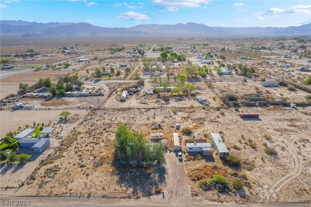 2350 Shawnee Street Sandy Valley, NV 89019 - Photo 13 of 38 View of rural area with a desert landscape and a mountain backdrop