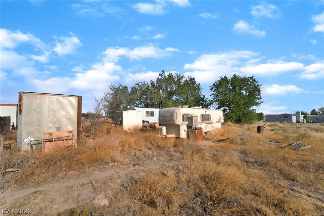 2350 Shawnee Street Sandy Valley, NV 89019 - Photo 17 of 38 View of yard featuring an outbuilding