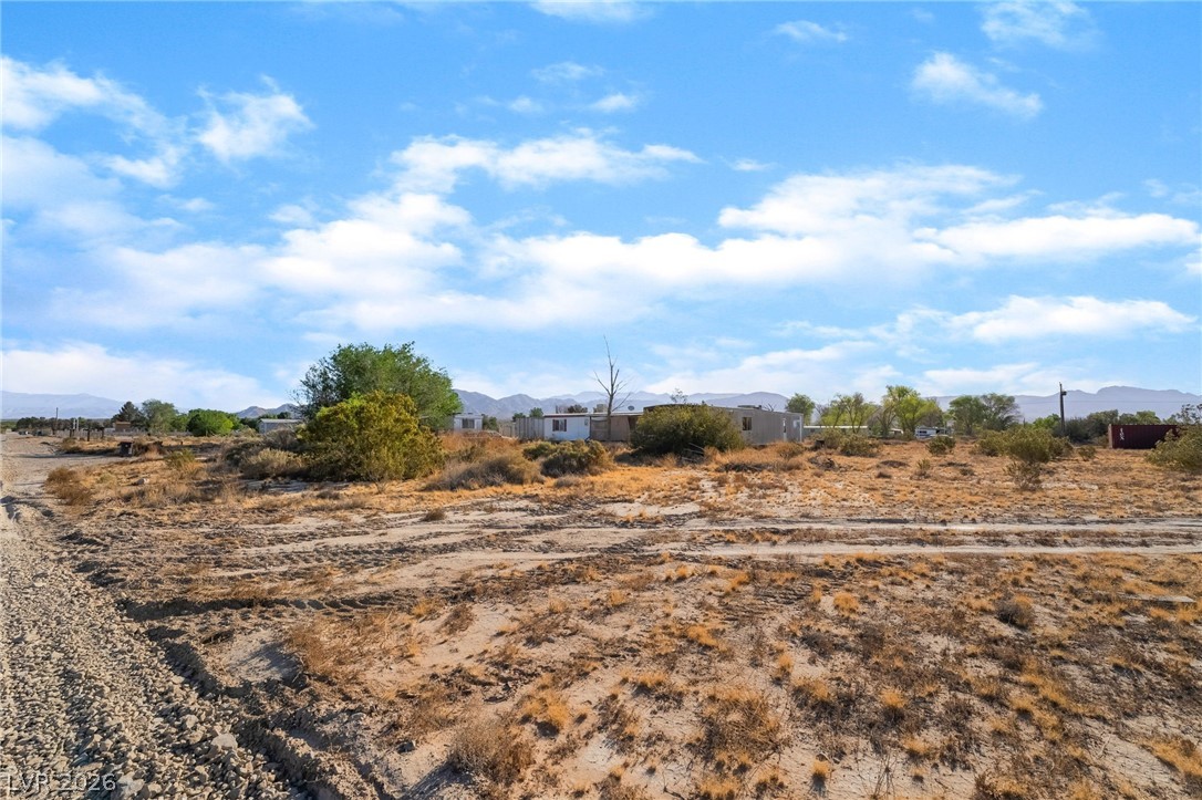 2350 Shawnee Street Sandy Valley, NV 89019 - Photo 19 of 38 View of yard featuring a mountain view