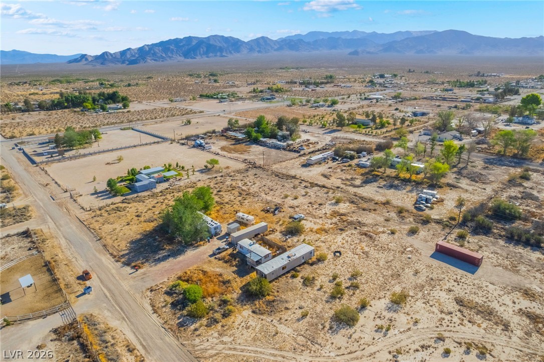 2350 Shawnee Street Sandy Valley, NV 89019 - Photo 23 of 38 View of rural area with a desert landscape and a mountain backdrop