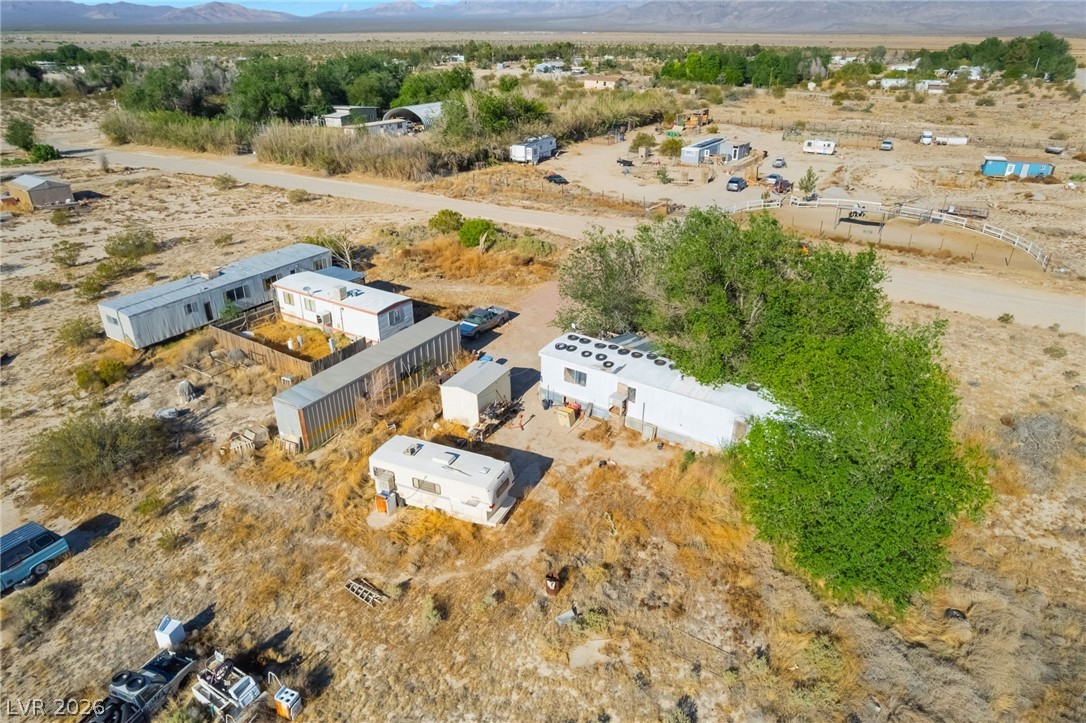 2350 Shawnee Street Sandy Valley, NV 89019 - Photo 28 of 38 View of rural area with a mountain backdrop and a desert landscape