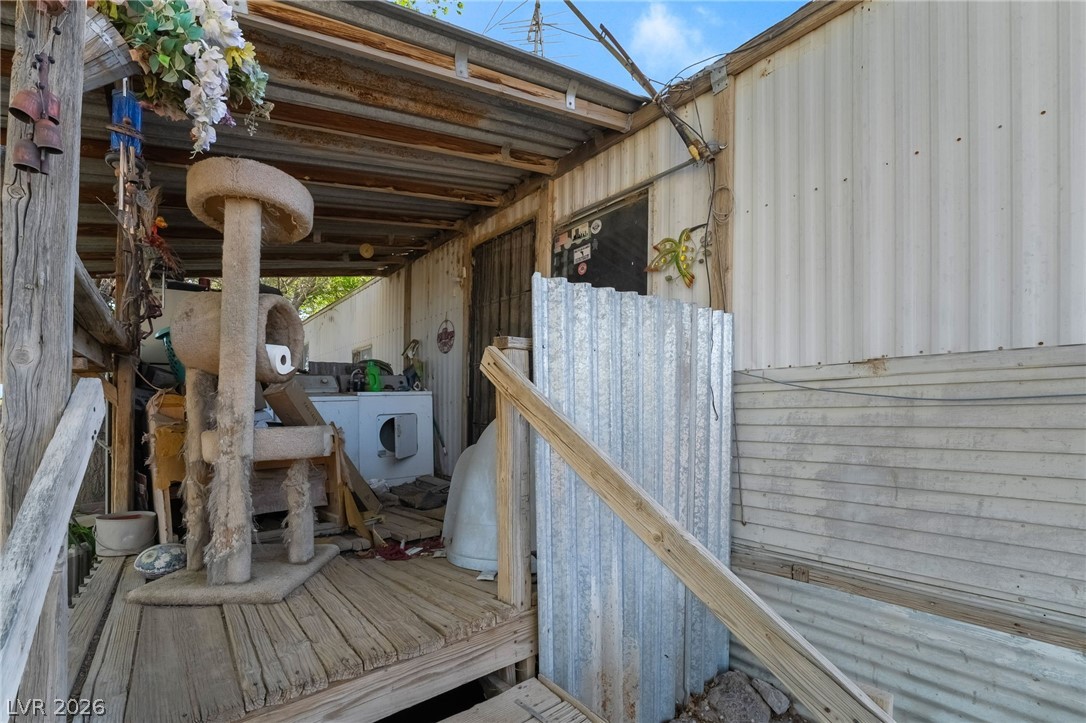 2350 Shawnee Street Sandy Valley, NV 89019 - Photo 34 of 38 Wooden deck featuring washing machine and dryer