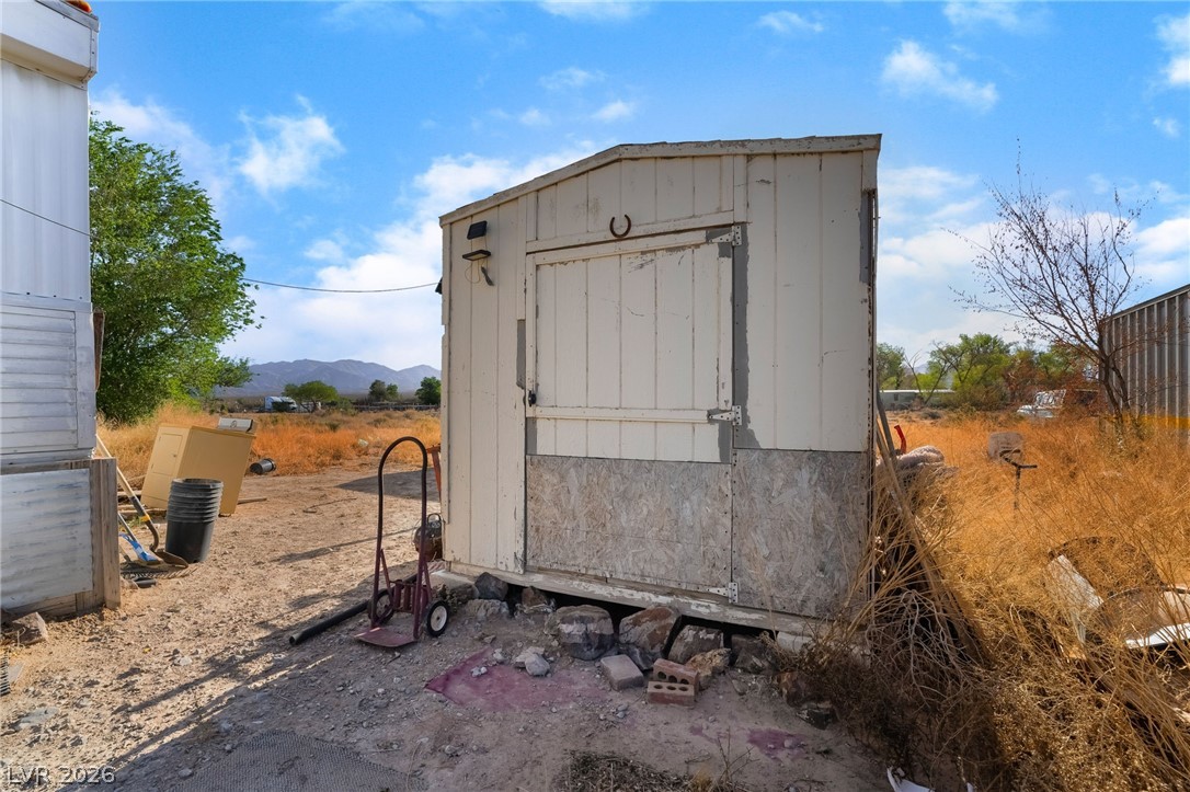2350 Shawnee Street Sandy Valley, NV 89019 - Photo 36 of 38 View of shed with a mountain view