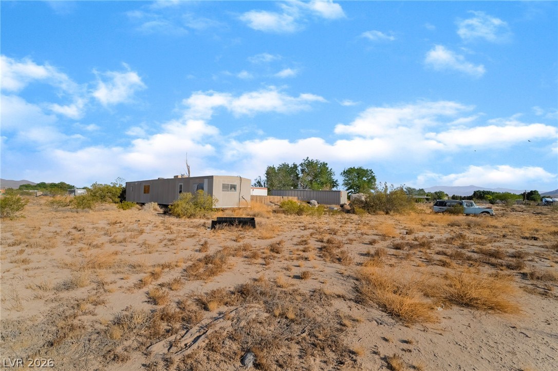 2350 Shawnee Street Sandy Valley, NV 89019 - Photo 38 of 38 View of yard with a mountain view