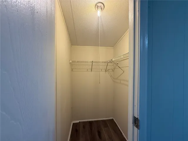 a view of livingroom with hardwood floor and a ceiling fan