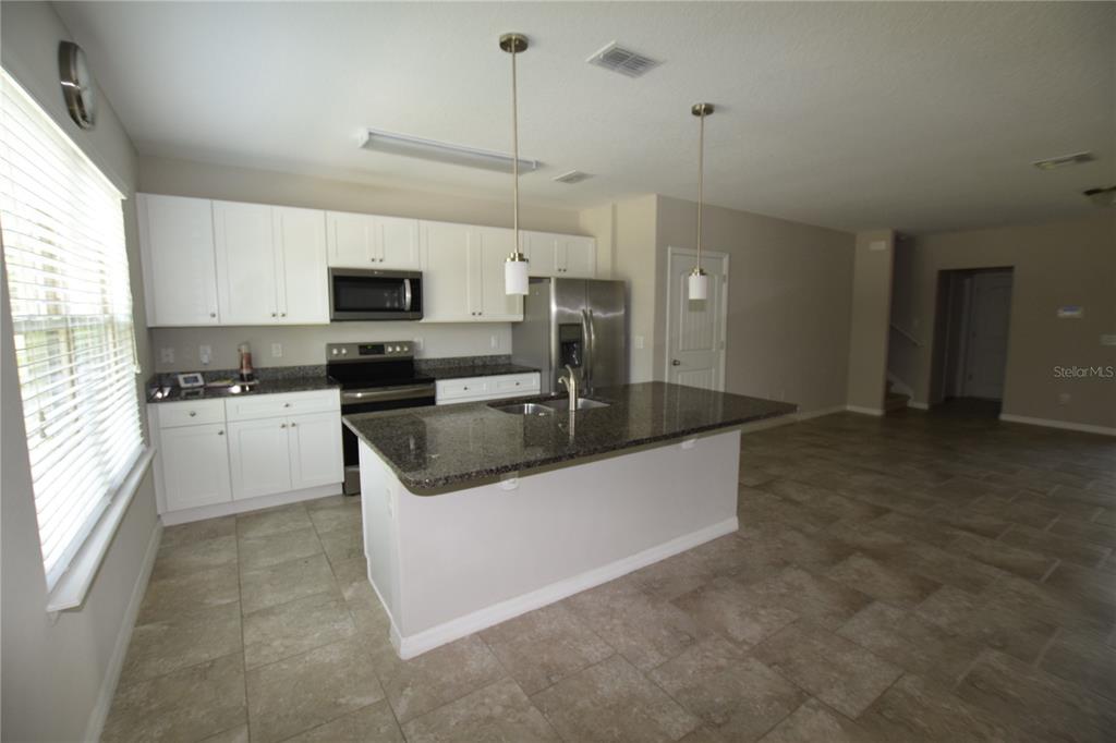 16097 Pebble Bluff Loop Winter Garden, FL 34787 - Photo 7 of 32