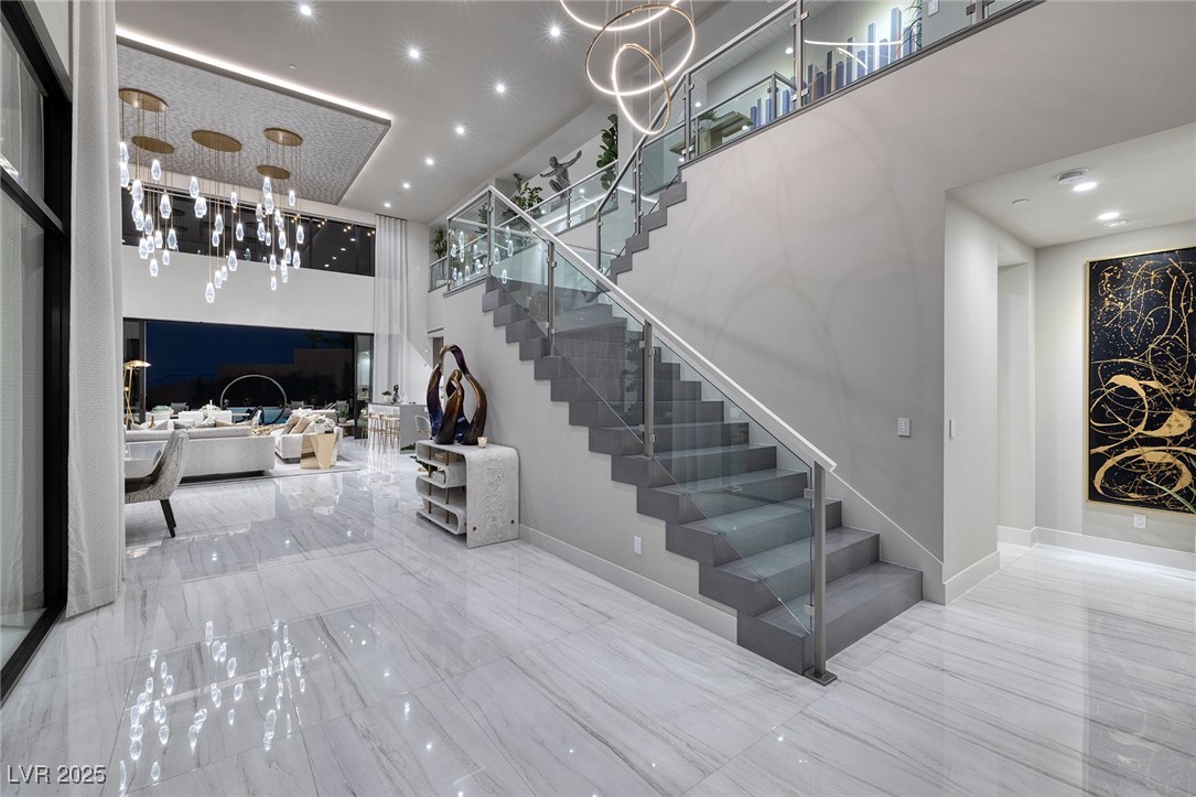 523 Overlook Rim Drive Henderson, NV 89012 - Photo 20 of 50 Foyer Stairs in Residence 3 Model Home