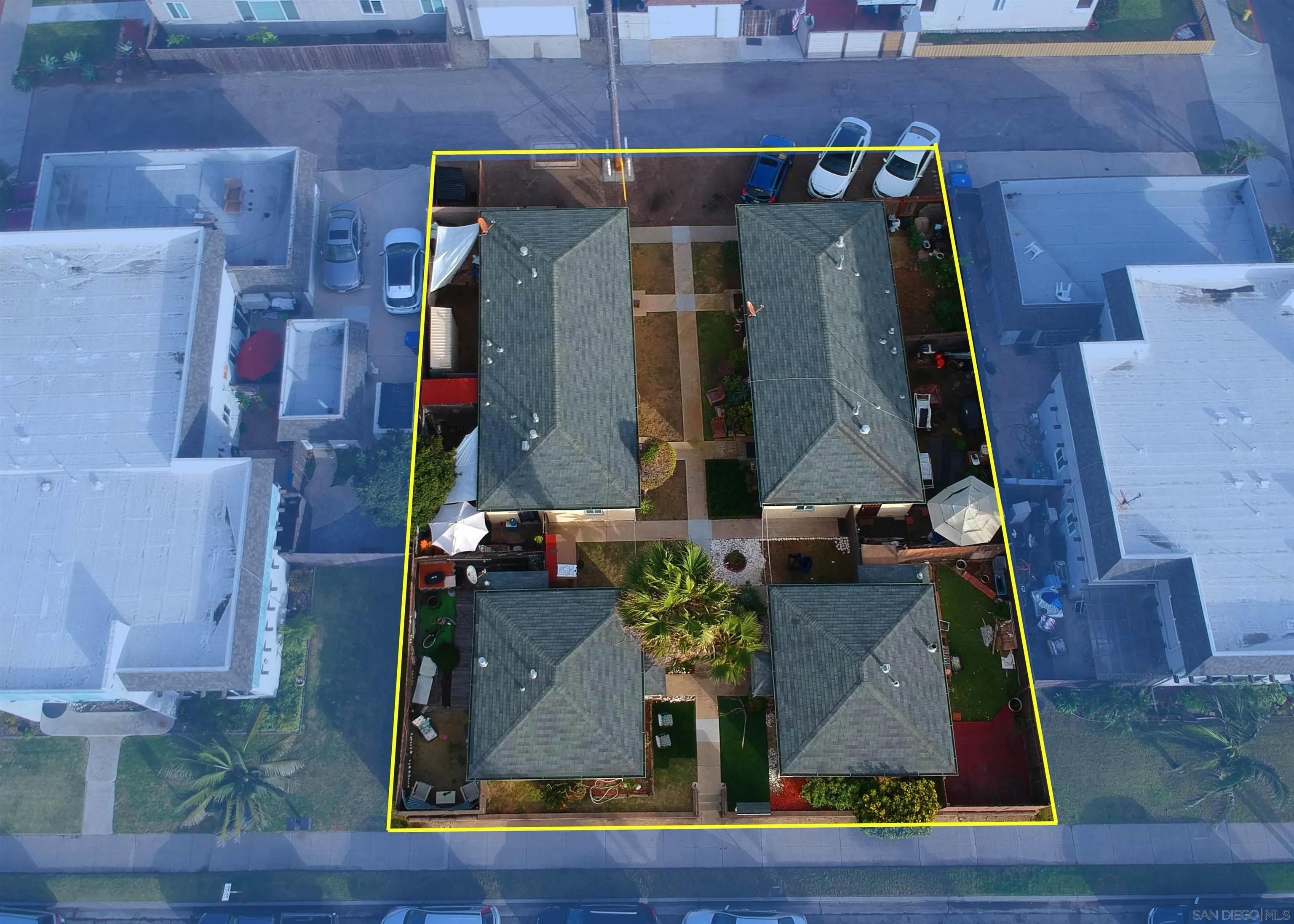 645-655 Seacoast Drive Imperial Beach, CA 91932 - Photo 2 of 10 an aerial view of houses with an outdoor space