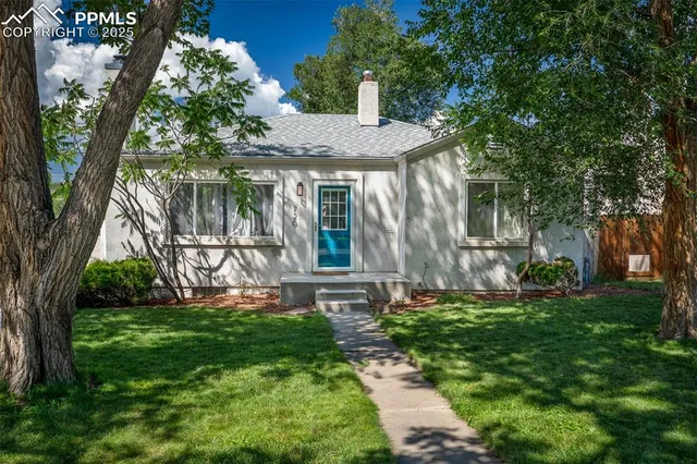 front view of house with a yard