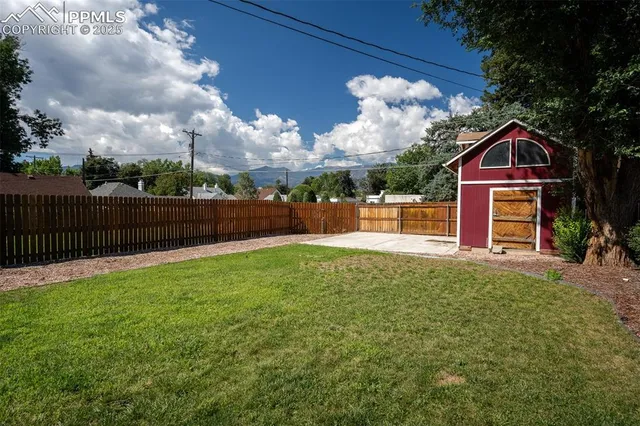 a view of a backyard with a garden