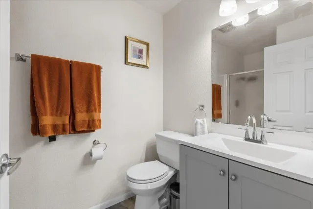 a bathroom with a sink and a toilet