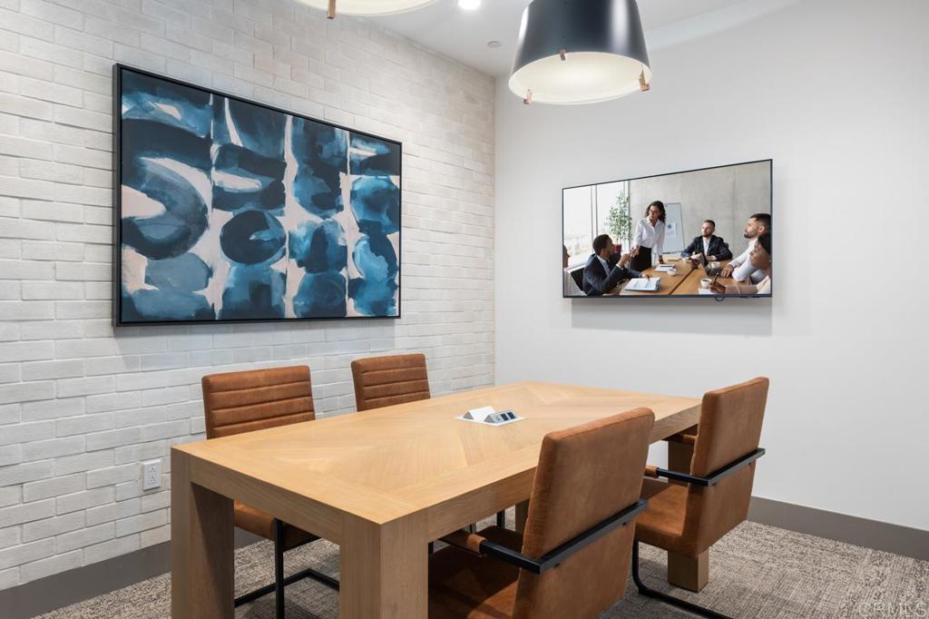 2060 Paseo Belluno, Unit 6 Chula Vista, CA 91913 - Photo 35 of 64 a view of a dining room with furniture and chandelier