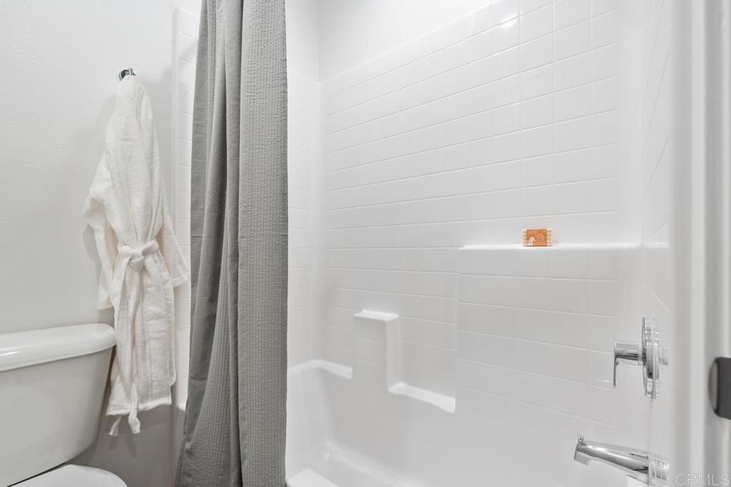 2060 Paseo Belluno, Unit 6 Chula Vista, CA 91913 - Photo 63 of 64 a bathroom with a shower and a toilet