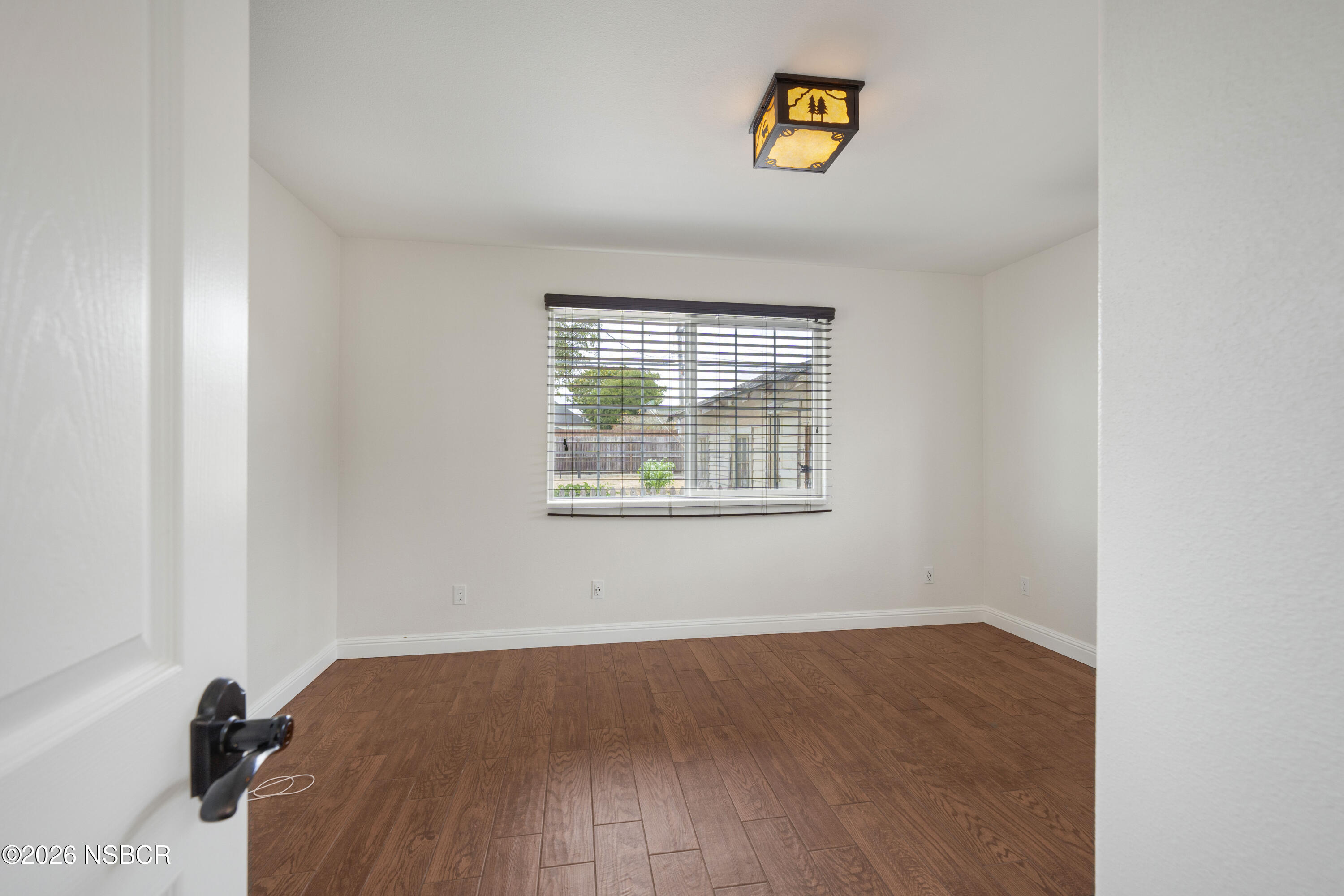 138 North E Street Lompoc, CA 93436 - Photo 23 of 35 an empty room with a window