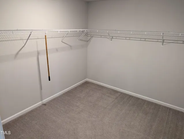 a view of a room with racks on the wall