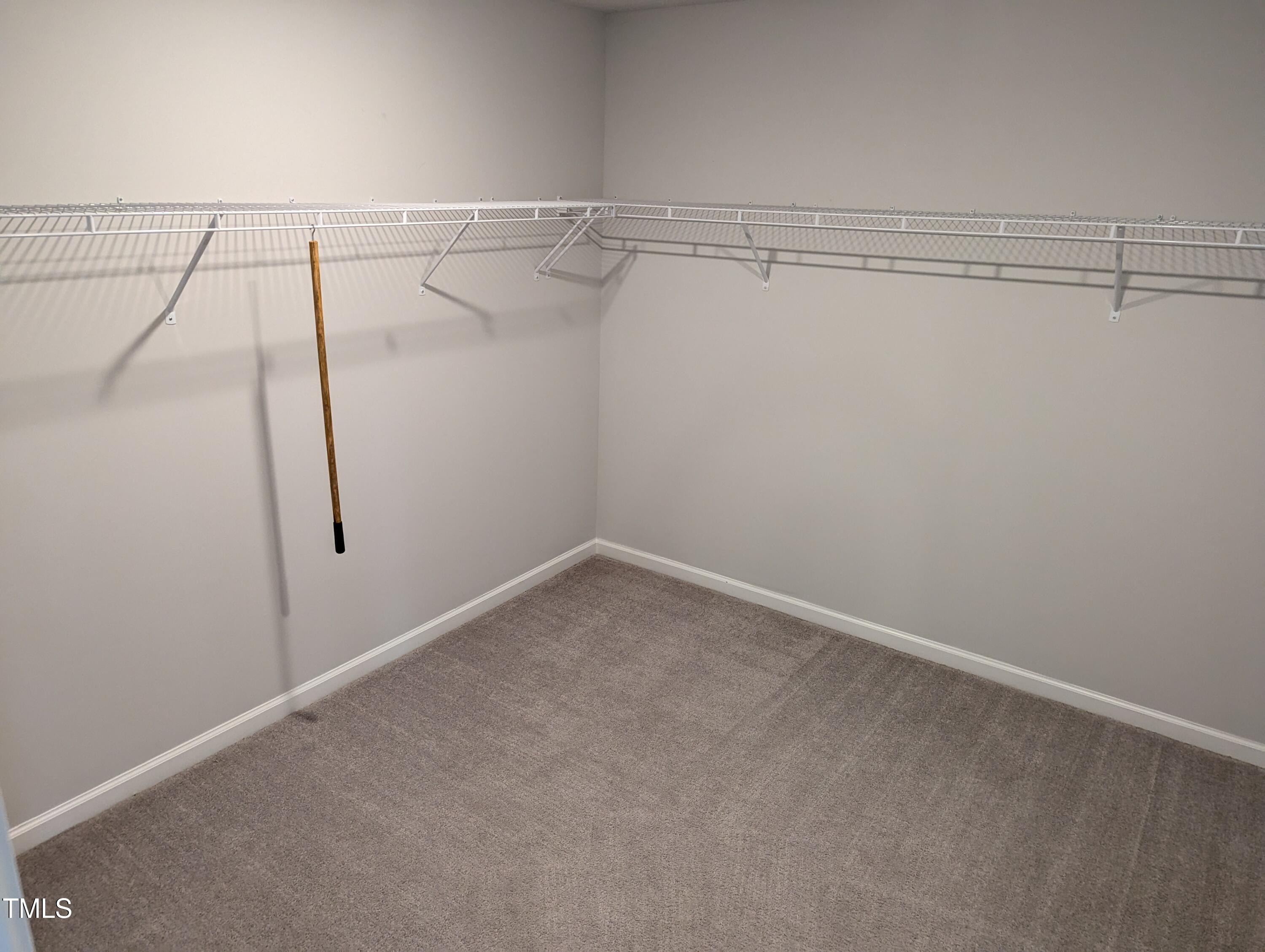 4020 Whitney Peak Drive Raleigh, NC 27616 - Photo 20 of 21 a view of a room with racks on the wall