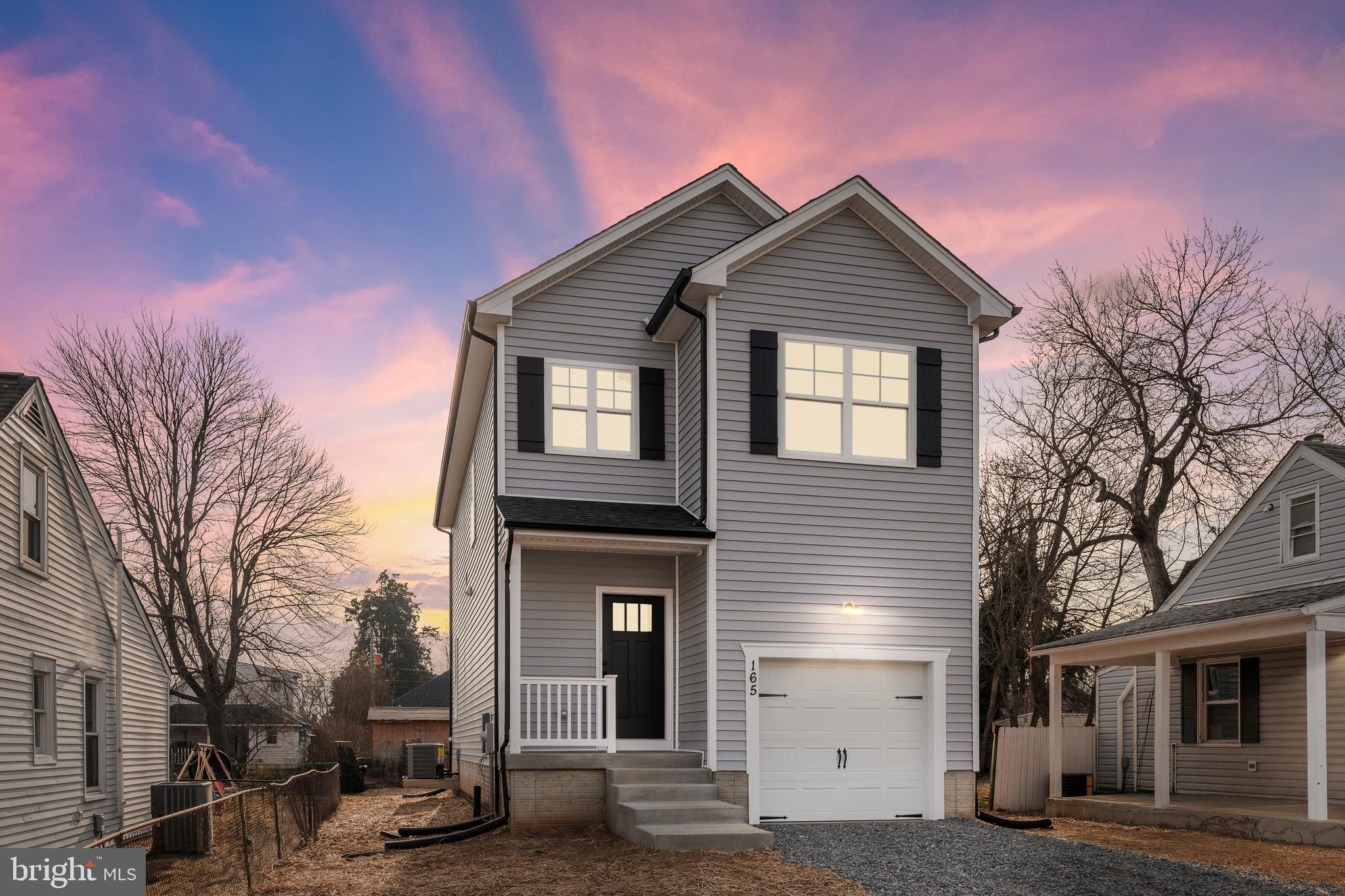 165 Bend Farm Road Fredericksburg, VA 22408 - Photo 1 of 51 a front view of a house with a yard