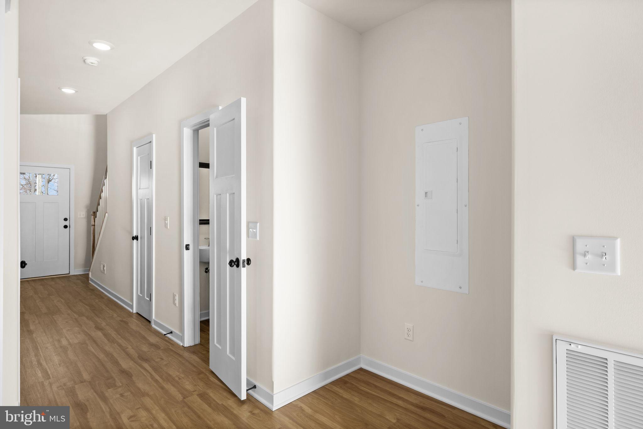 165 Bend Farm Road Fredericksburg, VA 22408 - Photo 18 of 51 a view of a hallway with wooden floor